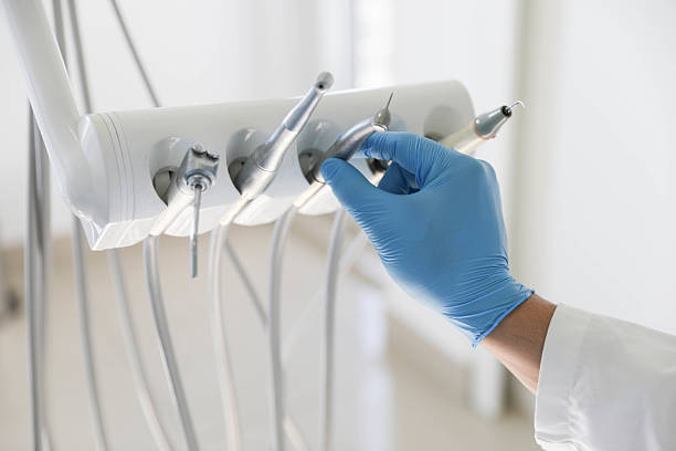 Professional Tooth Extraction technician working in Lake Los Angeles, CA